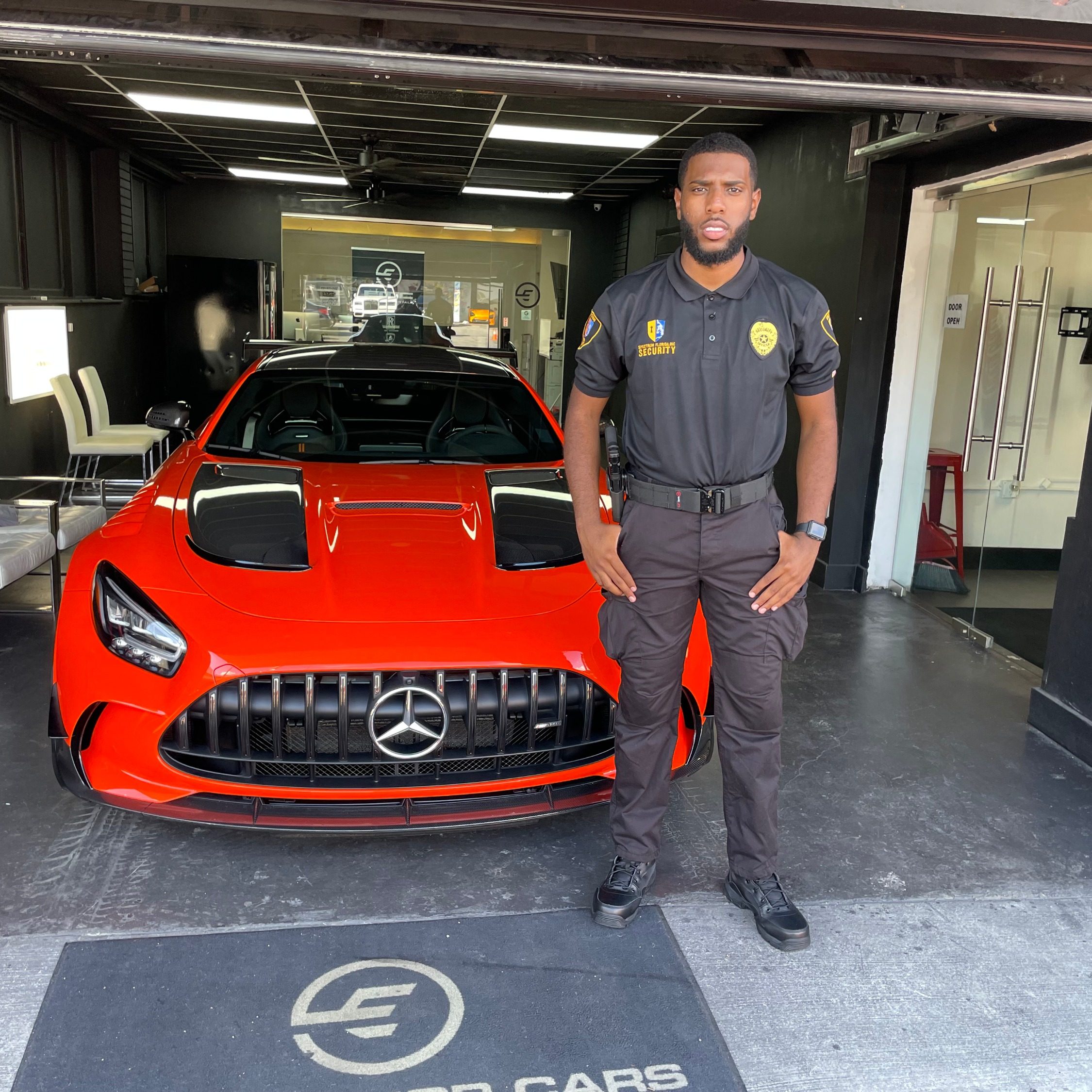 Spectrum Florida Security patrol vehicle staged in a garage